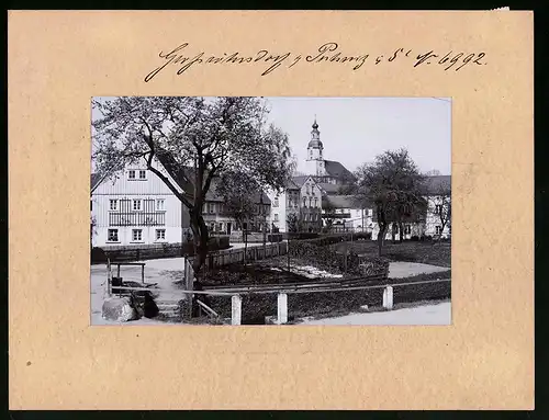 Fotografie Brück & Sohn Meissen, Ansicht Grossröhrsdorf i. Sa., Blick in den Ort mit Kirche