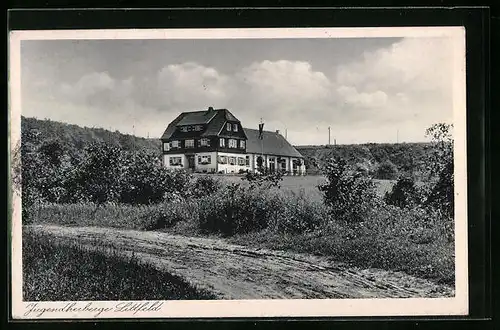 AK Littfeld, Jugendherberge vom Feldweg gesehen