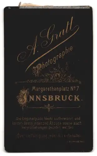 Fotografie A. Gratl, Innsbruck, Margharetenplatz 7, Junger Geistlcher mit Brille im bürgerlichen Anzug