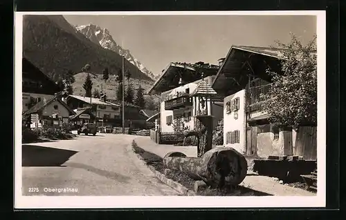 AK Obergrainau, Strassenpartie mit Frieseur