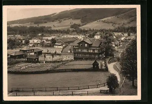 AK Ruhpolding /Obb., St. Annahaus, Gartenseite mit Liegehallen