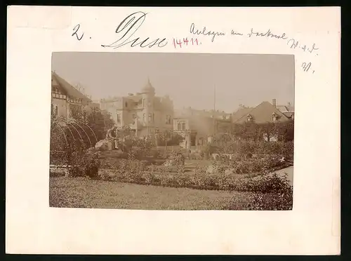 Fotografie Brück & Sohn Meissen, Ansicht Dux, Partie in den Anlangen am Denkmal Walters von der Vogelweide