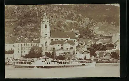 Foto-AK Rossatz /Donau, Uferpartie mit Kirche und Dampfer
