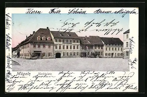 Goldfenster-AK Mügeln, Marktplatz mit leuchtenden Fenstern