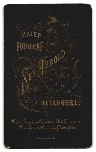 Fotografie Seb. Herold, Kitzbühel, Junge Dame im Kleid mit Hochsteckfrisur
