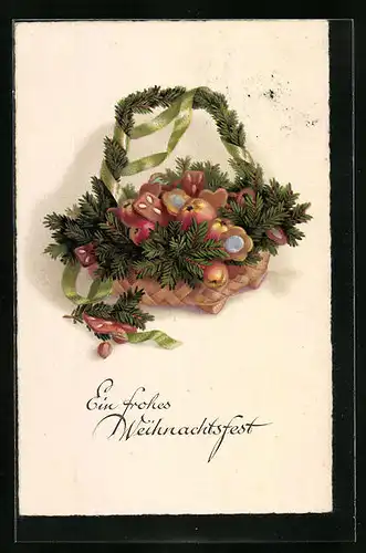 Künstler-AK Korb mit Tannenzweigen und Lebkuchen zum Weihnachtsfest