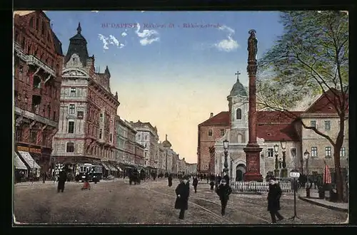 AK Budapest, Rácóczistrasse mit Denkmal und Passanten, Strassenbahn