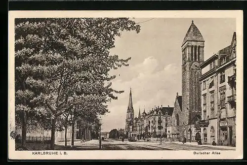 AK Karlsruhe i. B., Durlacher Allee mit Geschäft und Kirche, Strassenbahn