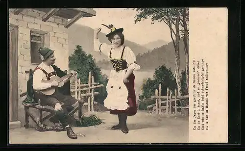 AK Bursche mit Gitarre und tanzendes Mädchen im Dirndl