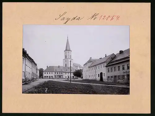 Fotografie Brück & Sohn Meissen, Ansicht Sayda i. Erzg., Lutherplatz mit Handlung Emil Kreller, Buchbinder Max Wagner