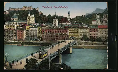 AK Salzburg, Strassenpartie mit Strassenbahn, Staatsbrücke
