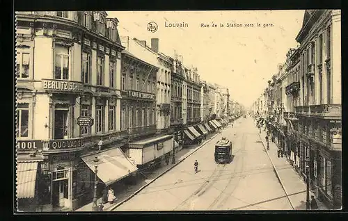 AK Louvain, Rue de la Station vers la gare, Strassenbahn