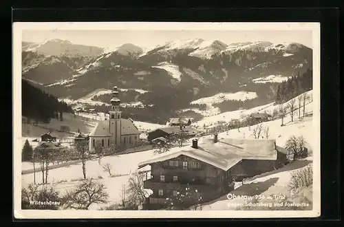 AK Oberau /Wildschönau, Ortspartie im Schnee gegen Schatzberg und Joelspitze