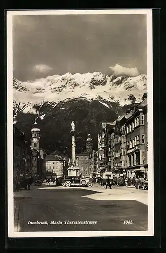 AK Innsbruck, Maria Theresienstrasse mit Geschäften und Denkmal