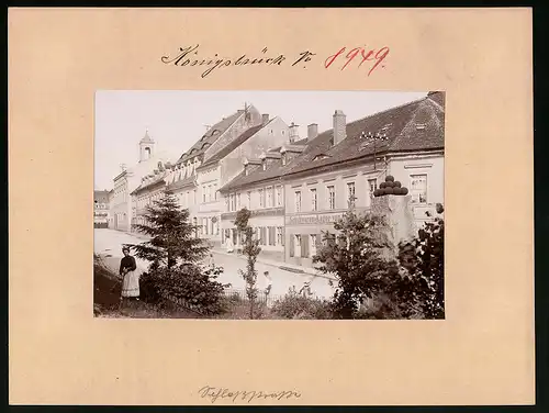 Fotografie Brück & Sohn Meissen, Ansicht Königsbrück, Schlossstrasse mit Schuhwarenlager & Glaserei