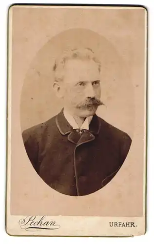 Fotografie G. Pechan, Urfahr, Rudolfsstr. 3, Portrait stattlicher Herr mit Schnurrbart im Jackett