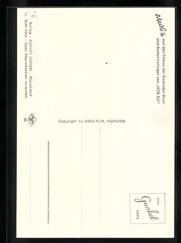 AK Mecki reist an mit einem Koffer in der Hand