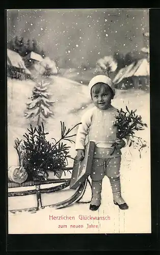 AK Kleiner Junge mit Paket und Schlitten im Winter, Neujahrsgruss