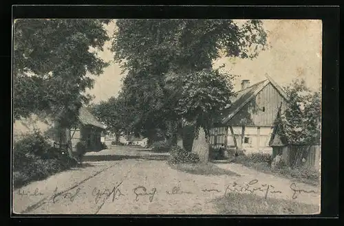 AK Ütz /Mark, Blick die Dorfstrasse entlang