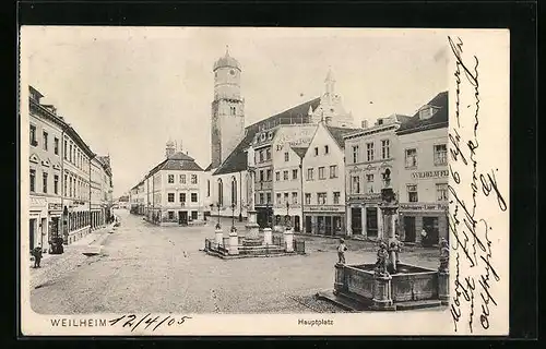 AK Weilheim, Hauptplatz mit Geschäften und Brunnen