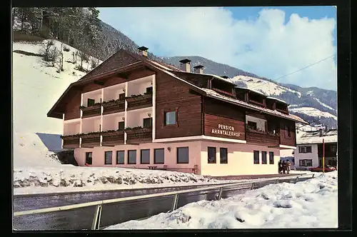 AK St. Johann /Ahrntal, Pension Ahrntalerhof, Haus in verschneiter Umgebung