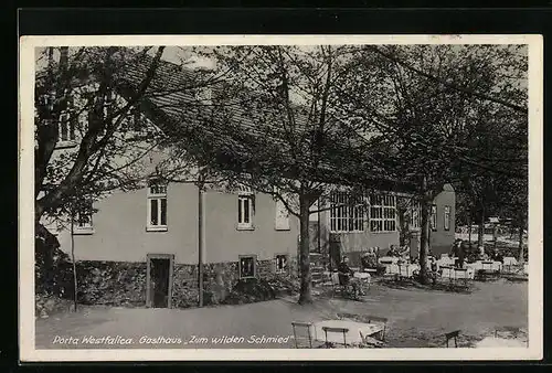 AK Porta Westfalica, Gasthaus Zum wilden Schmied - Gartenansicht