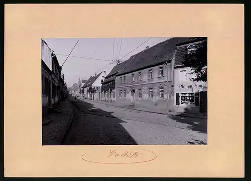 Fotografie Brück & Sohn Meissen, Ansicht Strehla, Hauptstrasse mit Gasthaus zum Deutschen Haus & Laden Philipp Saga