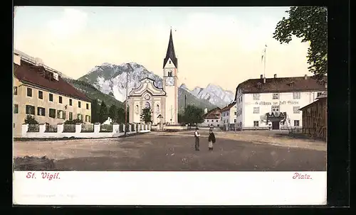 AK St. Vigil, Platz mit Gasthaus zur Post Stern und Kirche