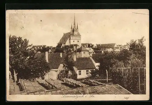 AK Lommatzsch i. Sa., Ortspartie mit Kirche