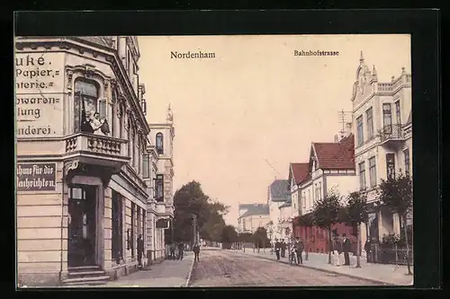 AK Nordenham, Blick in die Bahnhofstrasse mit Schreibwarenhandlung