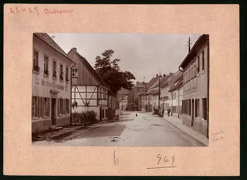 Fotografie Brück & Sohn Meissen, Ansicht Oederan i. Sa., Blick in die Hainichener Strasse an der Schneiderei Max Wollny