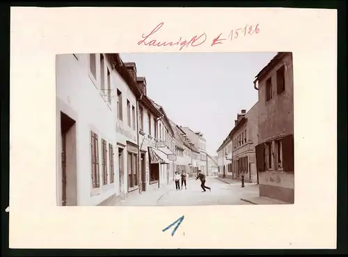 Fotografie Brück & Sohn Meissen, Ansicht Lausigk, Grimmaerstrasse mit materialwarenladen F. W. Pöhnert