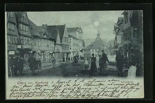 Mondschein-AK Harburg, Schlossstrasse mit Passanten