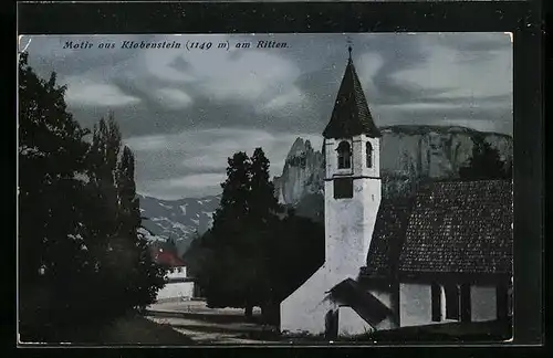 AK Klobenstein am Ritten, Ortspartie mit Kirche am Abend