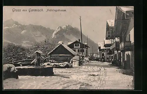 AK Garmisch, Frühlingstrasse mit Brunnen im Schnee