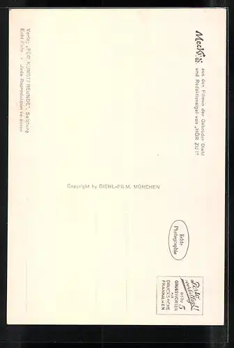 AK Mecki hält Maiglöckchen in der Hand