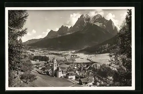 AK Sesto, Ortsansicht vor Bergpanorama