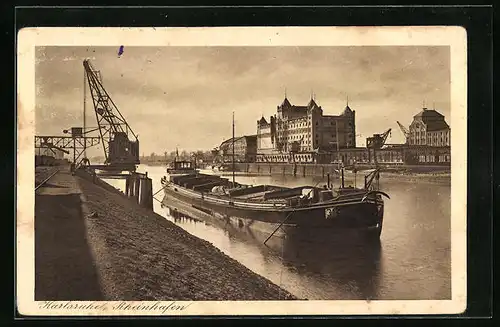 AK Karlsruhe, Uferpartie, Frachtschiff im Rheinhafen, Kran