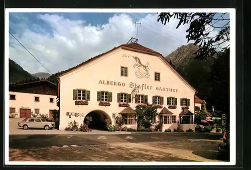 AK Mauls, Gasthof Stafler, Aussenansicht mit Fassandenmalerei