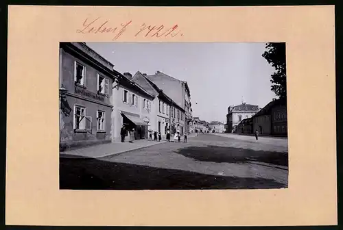 Fotografie Brück & Sohn Meissen, Ansicht Lobositz, Hauptstrasse mit Gasthaus Zum Anker und Ladengeschäften