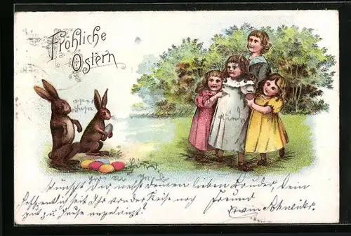 Künstler-AK Familie beobachtet Osterhasen
