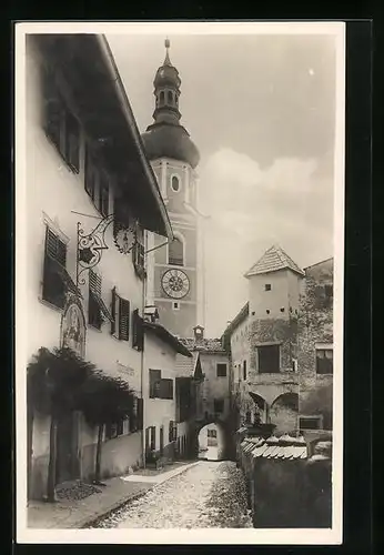 AK Kastelruth, Strassenbild mit Blick auf Kirche