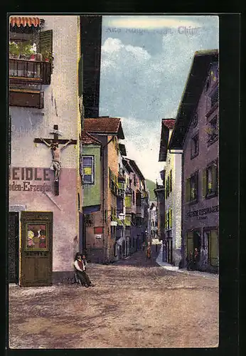 AK Klausen, Strassenpartie mit Fleischhauerei und Kruzifix an Hauswand