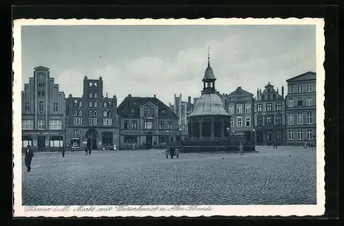 AK Wismar i. M., Markt mit Geschäften, Wasserkunst und Alter Schwede