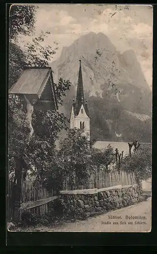 AK Seis am Schlern, Strassenpartie mit Holzzaun und Wegkreuz