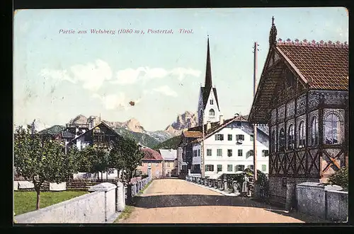 AK Welsberg, Strassenpartie mit Kirche