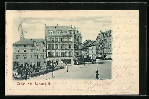 AK Löbau i. S., Ortspartie mit Park und Geschäften