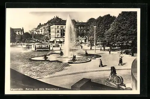 AK Mannheim, Partie vor dem Wasserturm mit Strassenbahn