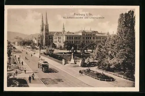 AK Freiburg i. Br., St. Johanniskirche und Lessingschule mit Strassenbahn