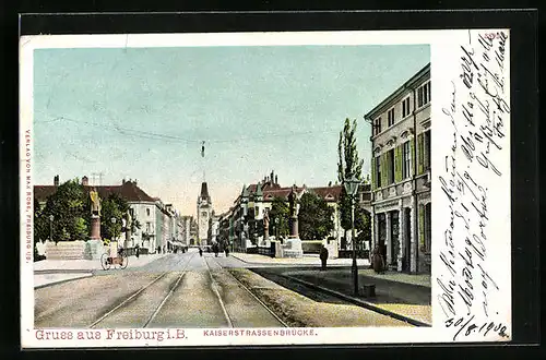 AK Freiburg i. B., Kaiserstrassenbrücke mit Geschäft